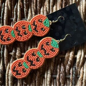 Vibrant Orange and Green Beaded Earrings with Intricate pumpkin Design